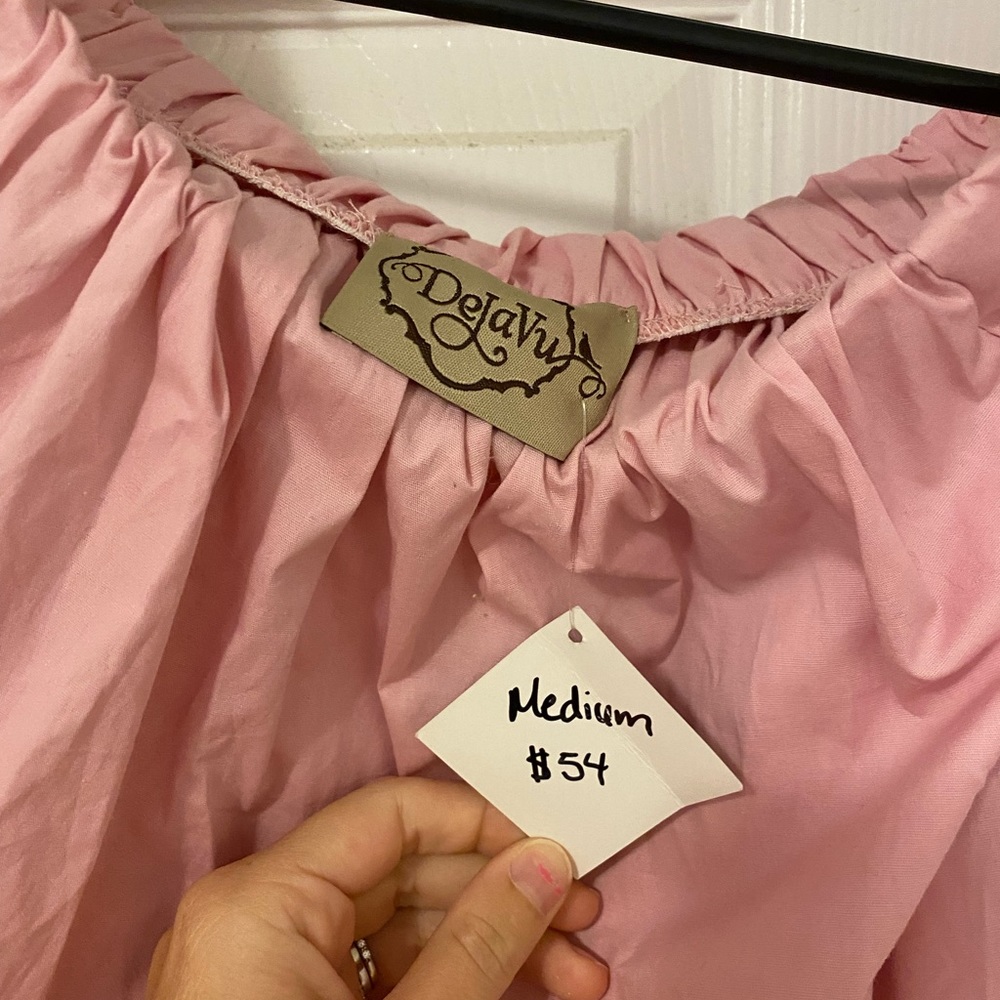 Pink off the shoulder top. New with tags.